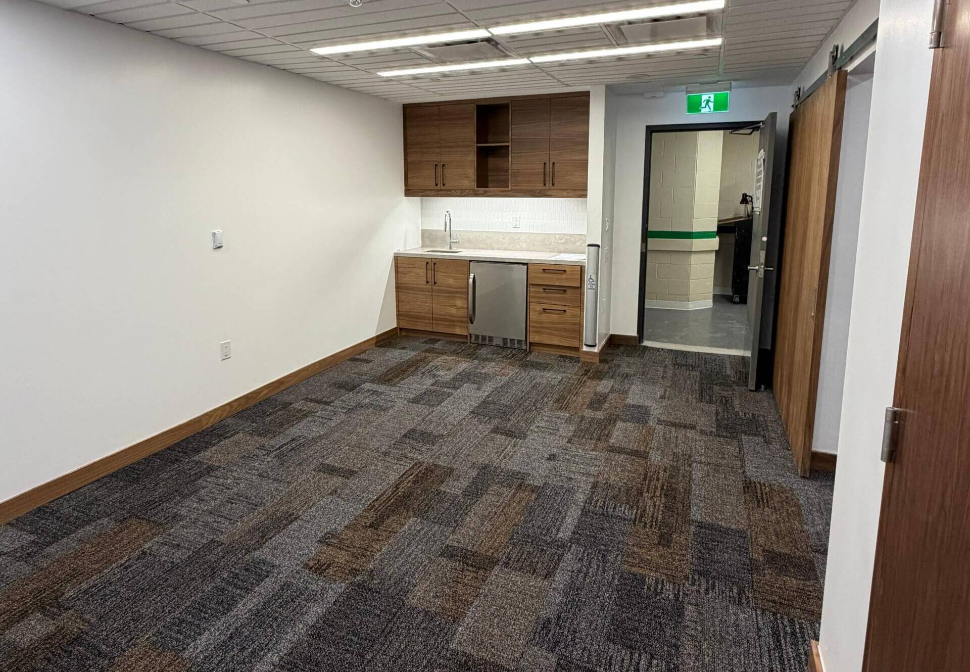 Acoustic ceiling tiles installed for sound absorption and noise reduction by Bento Reno Group